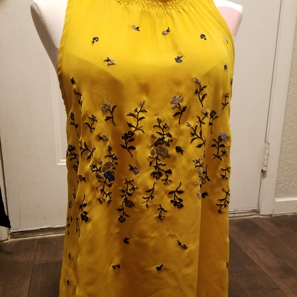 Yellow top with flower details